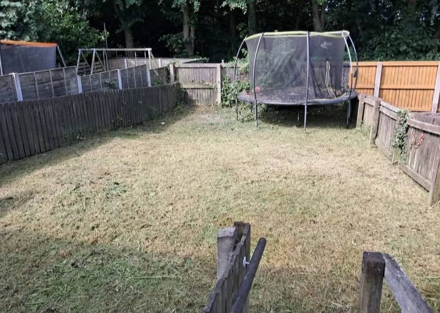 Overgrown garden cleared — after CRJ Gardening & Grounds