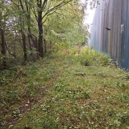 Industrial access path reopened — before CRJ Gardening & Grounds